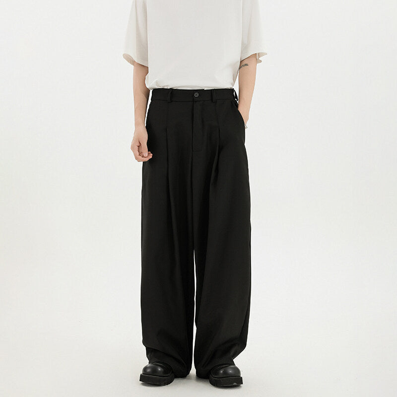 Black wide-leg tailored trousers