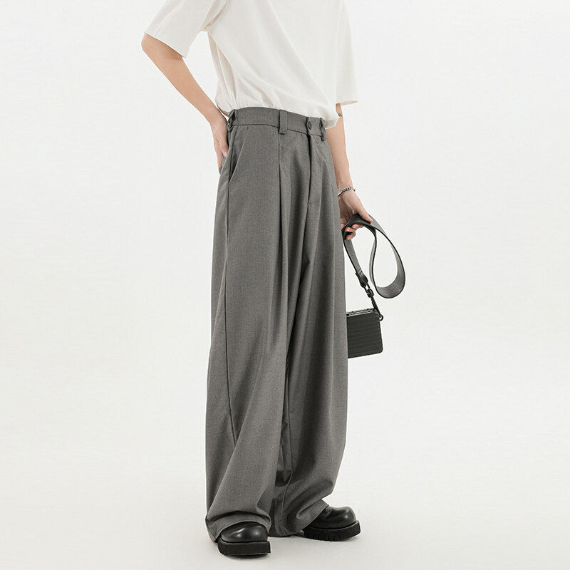 Black wide-leg tailored trousers