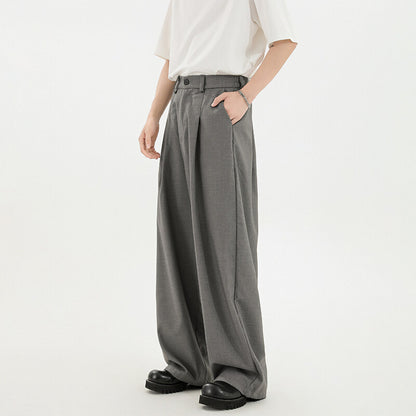 Black wide-leg tailored trousers
